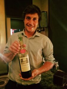 Adrien with a bottle of Chateau Coutet Cuvee Emeri