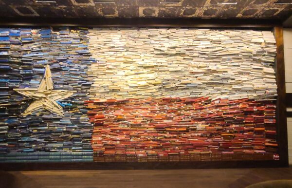 Artist Thedra Cullar-Ledford collected 10,000 Texas-focused books to assemble this replica of the Lone Star State flag. It is displayed at The George Hotel in College Station and was created to recognize First Lady Barbara Bush's dedication to promoting literacy and to honor Texas authors..