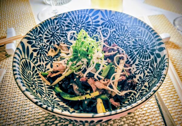 Scallion Lamb with garlic, pepper, sesame and rice noodles ($12 supplement) paired with Marqués de Tomares Gran Reserva Rioja 2018.