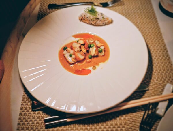 Scallops in lobster sauce with wild garlic, cashew and crispy rice ($18 supplement)