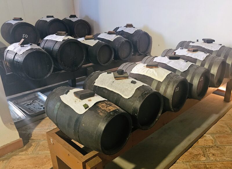 In addition to its Lambrusco wines, Paltrinieri produces balsamic vinegar, a specialty of Modena. Photo in the barrel room.