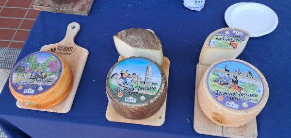Each wheel of Busti cheese has a special design featuring a uniquely Tuscan image
