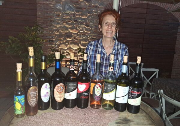 Elena Carmignani with the selections of her wines we tasted.