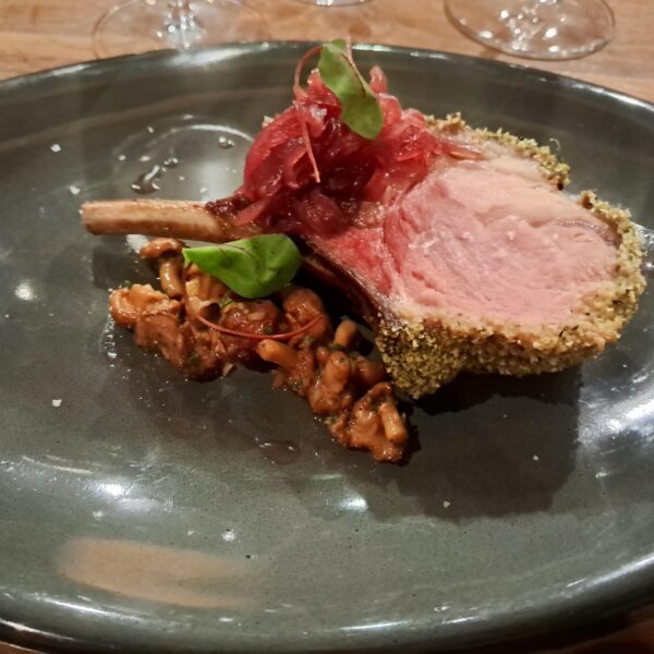 Herb-crusted roasted rack of wild boar
