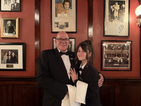 Father-daughter servers, Murphy and Megan Ruiz