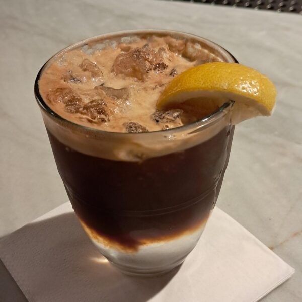 Espresso coffee and tonic with a lemon wedge is a refreshing pick-up!